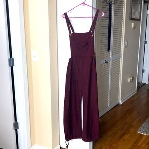 Cotton maroon overalls with wooden buttons and drawstring pant legs